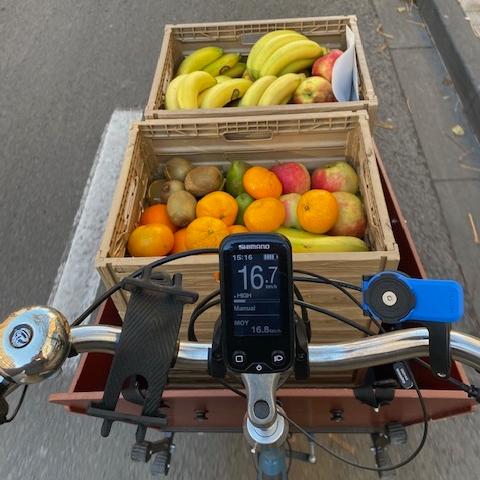 Bike riding with fruit for the delivery